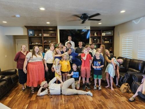 Alyssa with the cousins at her missionary farewell open house