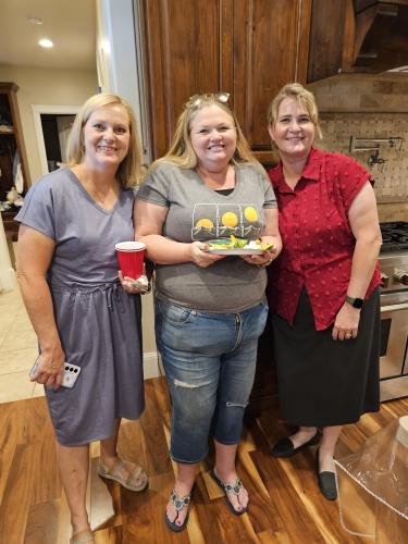 Amy, Lisa, and Jen in the kitchen during Alyssa's mission farewell open house