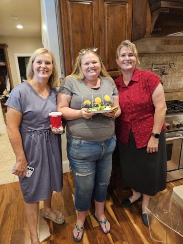 Amy, Lisa, and Jen in the kitchen during Alyssa's mission farewell open house