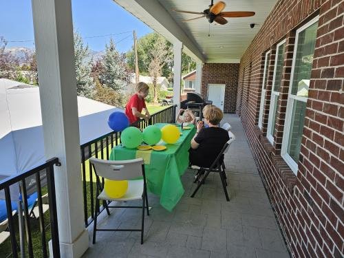 Eli, Jane, Paige, and Kate visit during Alyssa's mission farewell open house