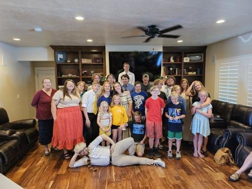 Alyssa with the cousins at her missionary farewell open house