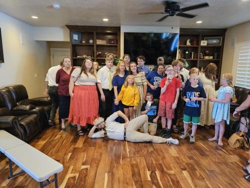 Alyssa with the cousins at her missionary farewell open house