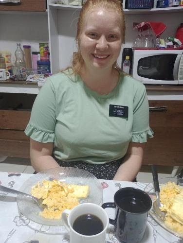 Alyssa with her plate of cuscuz
