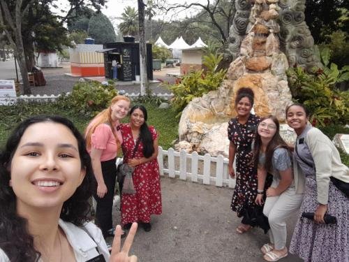 Alyssa and sister Perri with a big group of missionaries