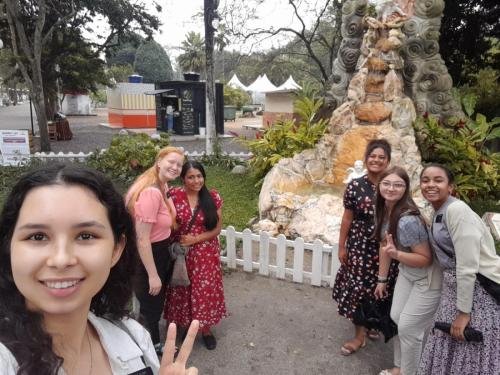 Alyssa and sister Perri with a big group of missionaries