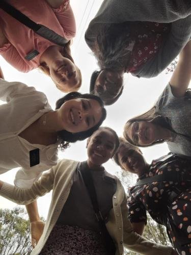 Alyssa and sister Perri with a big group of missionaries