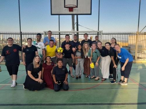 President Martins with Alyssa and her zone during a zone activity