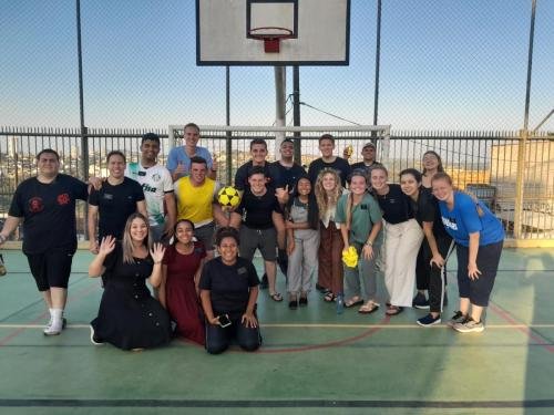 President Martins and Alyssa Grace with the zone during a zone activity