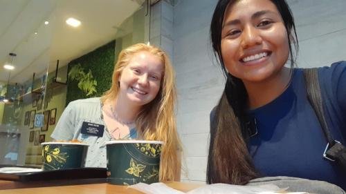 Alyssa and Sister Murrillo in a restaurant