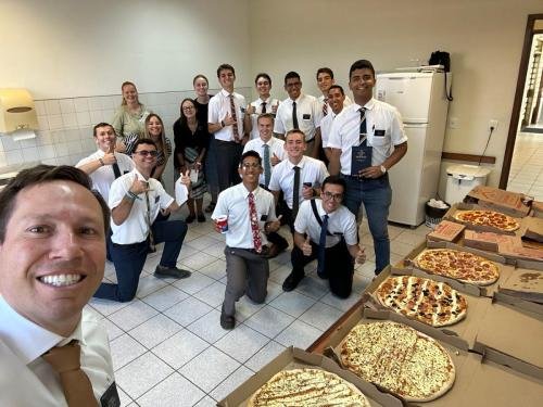 President Martins and Alyssa's zones with a lot of pizzas