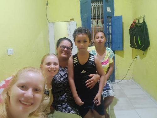 Alyssa and Sister Tadje visiting some members