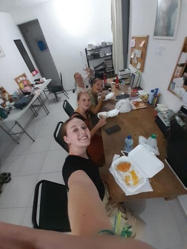 Alyssa and the other American missionaries enjoying a final meal together