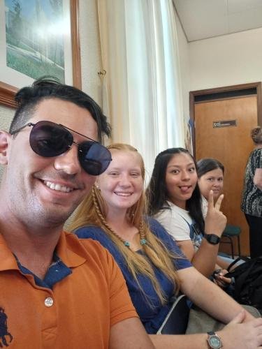 Alyssa and Siter Villatoro with some members in the church house