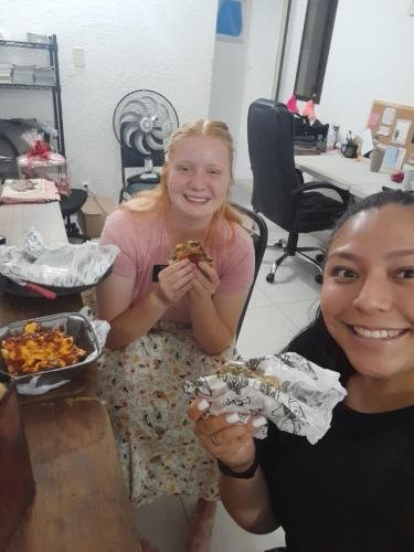Alyssa and Sister Villatoro enjoy some food