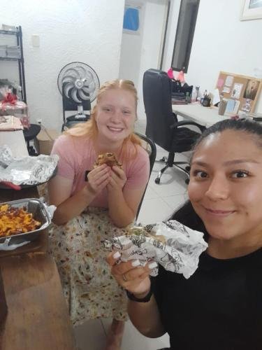 Alyssa and Sister Villatoro enjoy some food