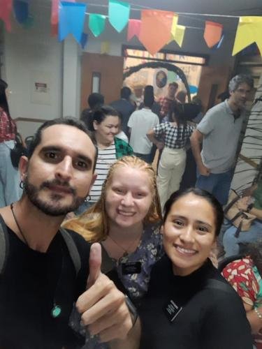 Alyssa and Sister Quispe with a friend at the ward party