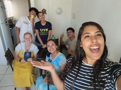 Alyssa and Sister Quispe in a member's house