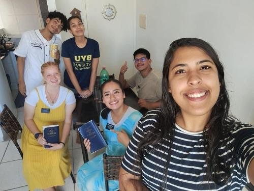 Alyssa and Sister Quispe in a member's house