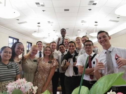 Alyssa with Sisters Quispe, Santiago, and Lima with the elders during a meeting
