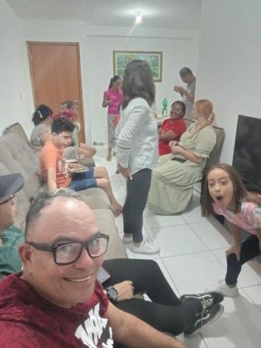 Alyssa and Sister Flores with a group of members