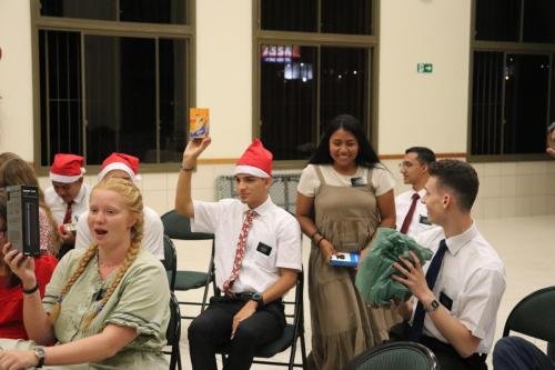 Alyssa holds her gift up as Sister Murrillo looks for a trade