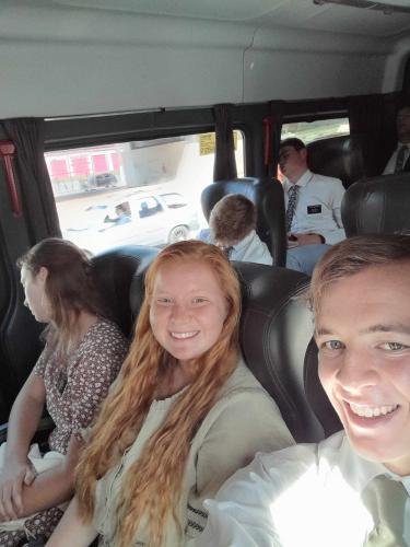 Alyssa on the bus from the temple with most of the elders sleeping