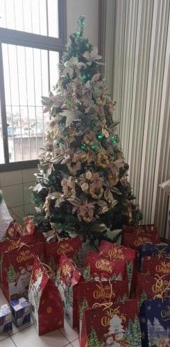 The Christmas tree and presents at Alyssa's Christmas party