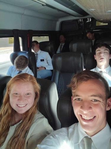 Alyssa on the bus from the temple with most of the elders sleeping